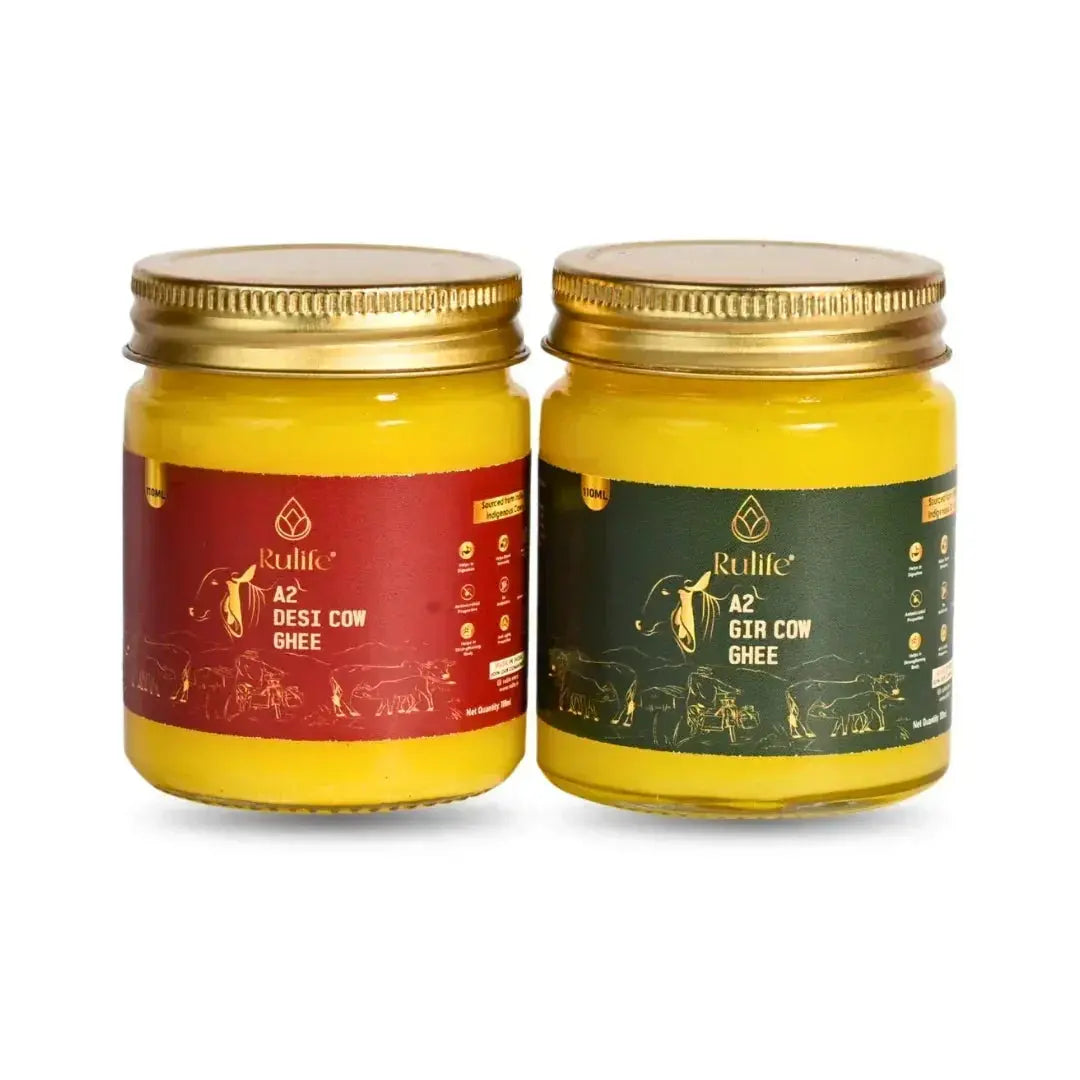 Two jars of Rukle A2 Desi Cow Ghee and A2 Gir Cow Ghee on a white background