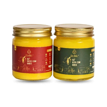 Two jars of Rukle A2 Desi Cow Ghee and A2 Gir Cow Ghee on a white background