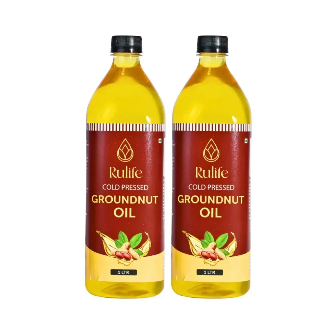 Two bottles of Rulife Cold Pressed Groundnut Oil on a white background