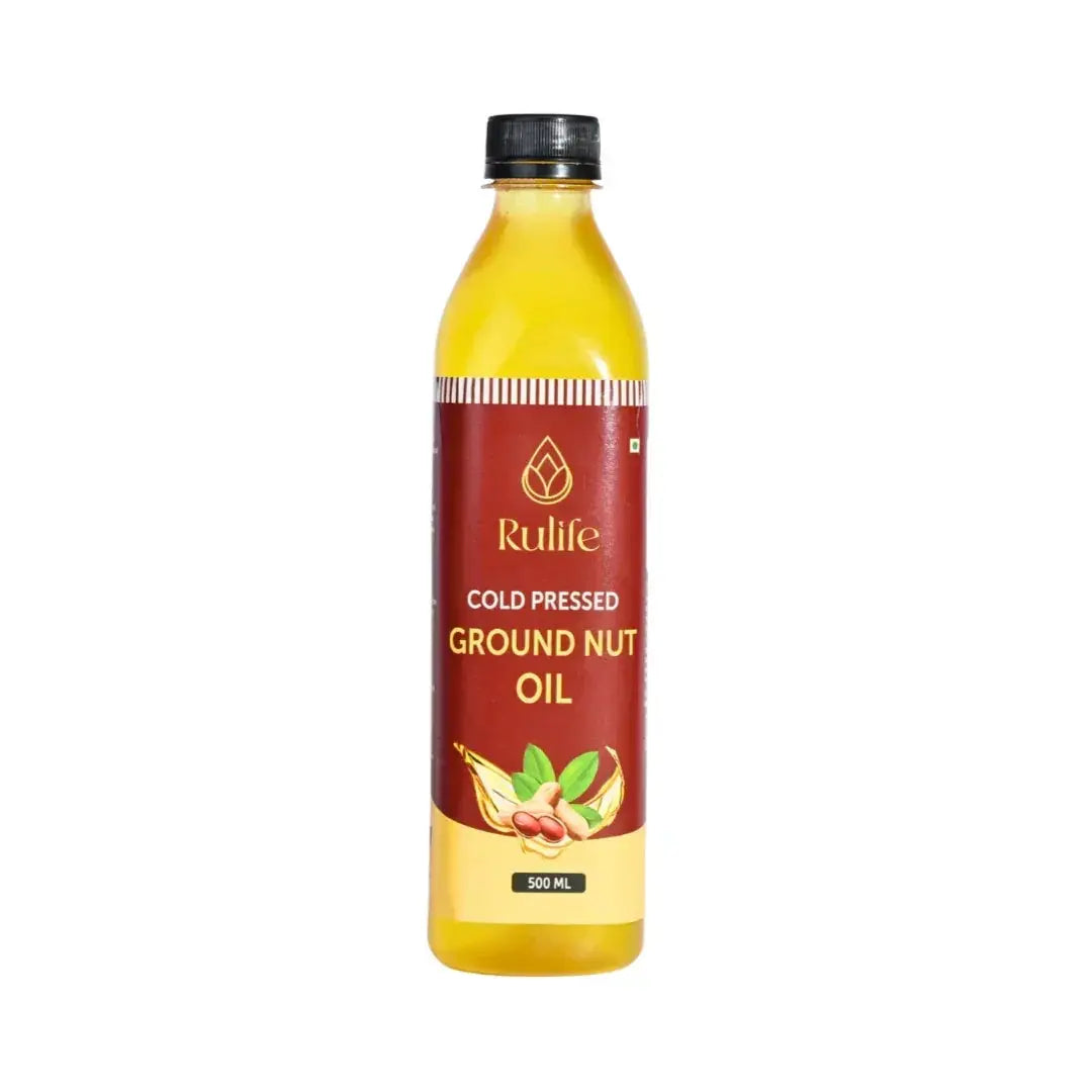 Bottle of Rulife cold pressed groundnut oil on a white background