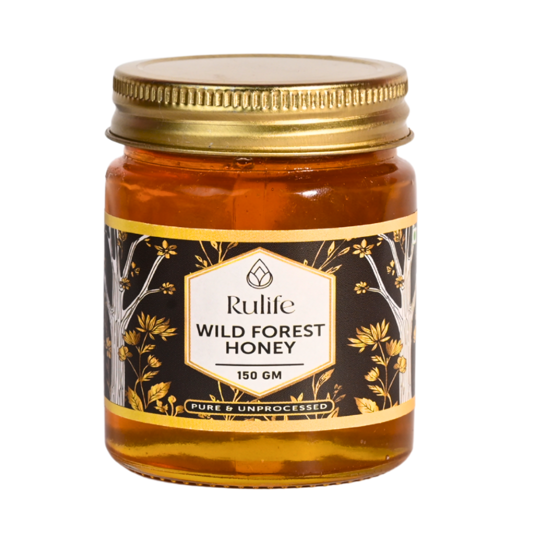 Jar of Rulife Wild Forest Honey with a gold lid on a white background